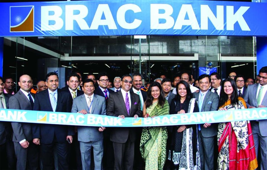 Tamara Hasan Abed, Senior Director, Enterprises, BRAC Bank inaugurating a new service outlet of the bank at Uttara in the city on Wednesday.