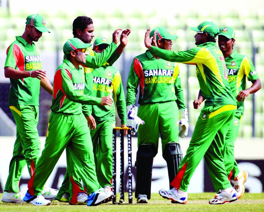 Players Bangladesh celebrate after dismissing Dinesh Chandimal of Sri Lanka during their second ODI at the Sher-e-Bangla National Cricket Stadium in Mirpur on Thursday.