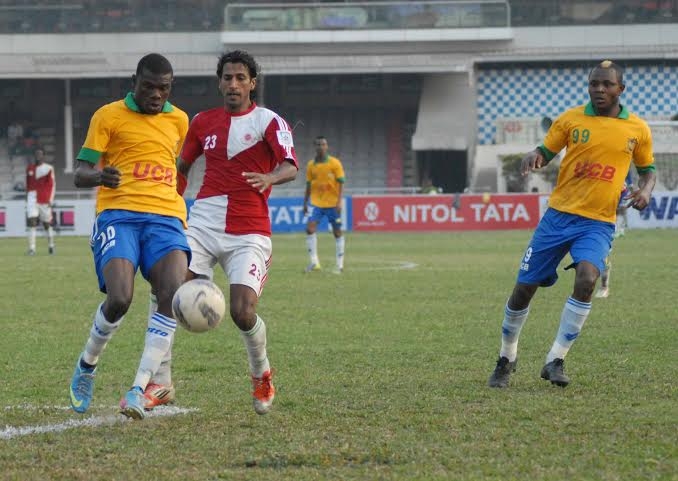 A scene from the match of the Nitol Tata Bangladesh Premier Football League between Sheikh Jamal Dhanmondi Club and Team BJMC at the Bangabandhu National Stadium on Saturday.