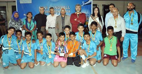 Saint Gregory's High School, the champions of the Boys' Group of the Milk Man Mini Handball Tournament pose for a photo session at the Shaheed (Capt) M Mansur Ali National Handball Stadium on Sunday.