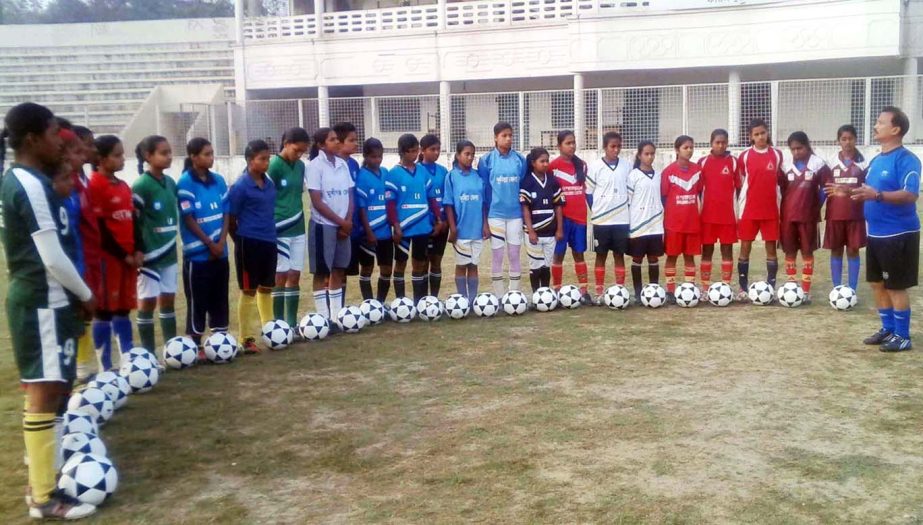 The participants of the Plan Under-15 Girls' Championship during their practice session at Faridpur Stadium on Thursday.