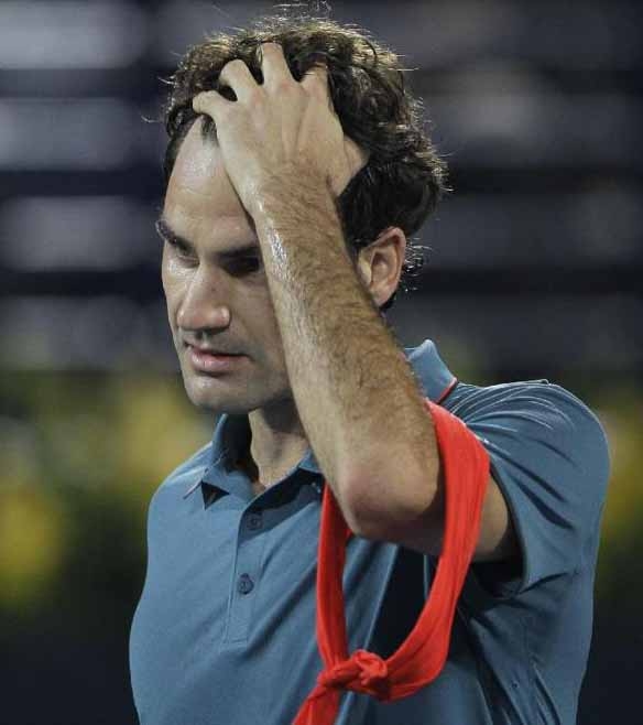 Roger Federer of Switzerland reacts after he beat Radek Stepanek of Czech Republic during the third day of the Dubai Duty Free Tennis Championships in Dubai, United Arab Emirates on Wednesday.