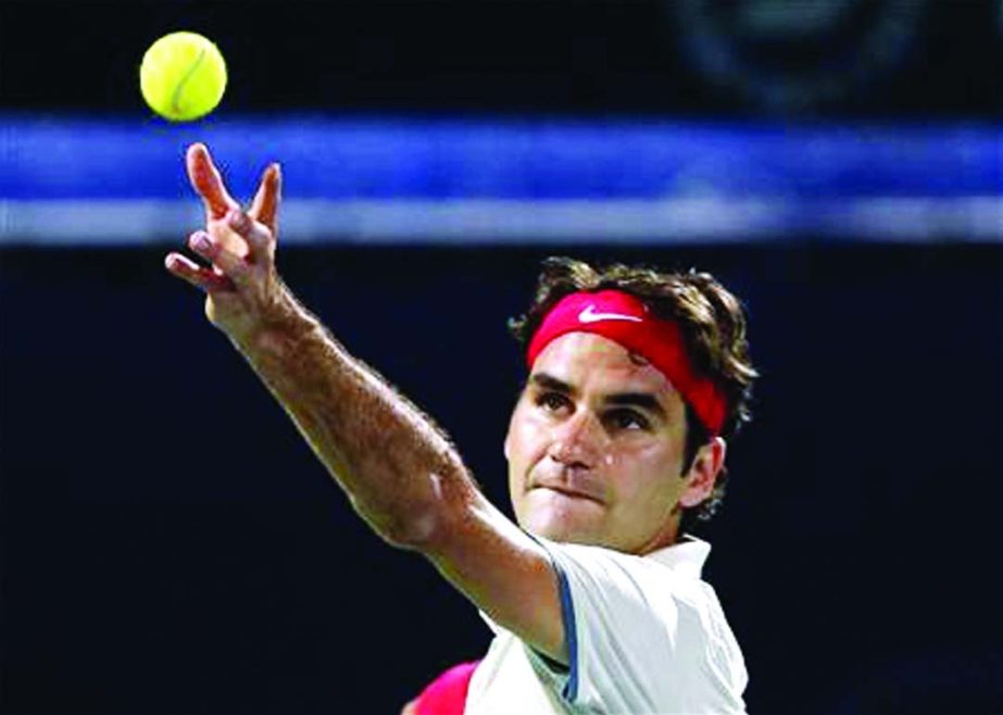 Roger Federer of Switzerland serves to Lukas Rosol of the Czech Republic during their men's singles match at the ATP Dubai Tennis Championships on Thursday.