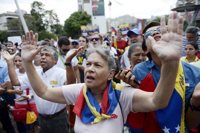 Anti-government demonstrators protest in eastern Caracas.