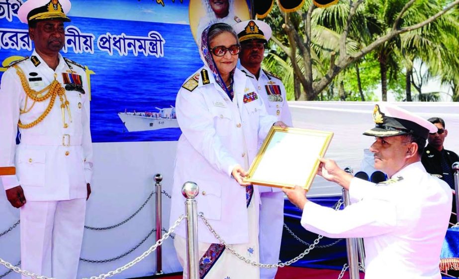 Prime Minister Sheikh Hasina handing over commissioning 'forman' (order) of the two warships to the commanding officer at BNS Naval Base Isa Khan in Chittagong on Saturday. ISPR photo