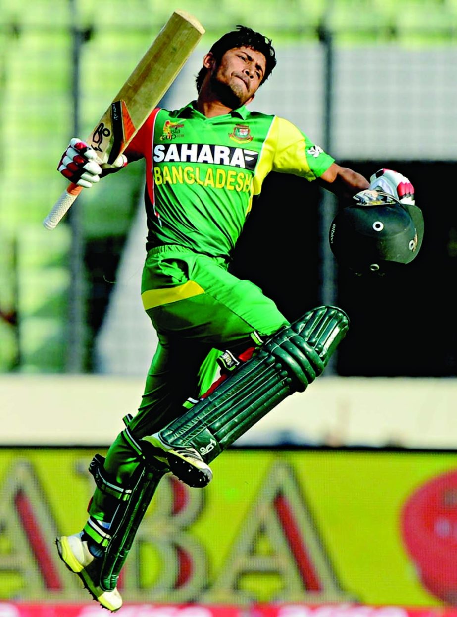 Anamul Haque leaps in joy after reaching his hundred during Asia Cup match between Bangladesh and Pakistan in Mirpur on Tuesday.