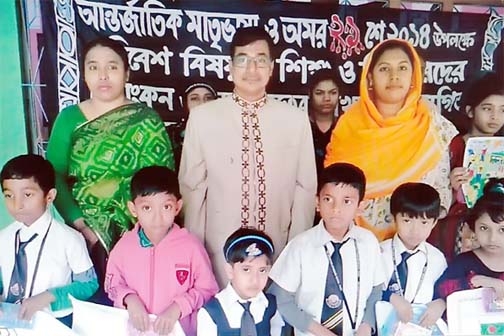 Children seen at photo session after receiving prize of an art competition to mark the International Mother Language Day organised by Ava Krira & Sangskritik Foundation at Exception Standard School ground in the capital recently.