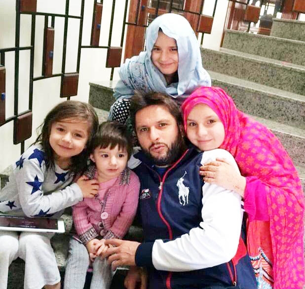 Afridi with his four dauters.