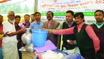 RANGPUR: SKS Foundation distributing household goods at a ceremony among 650 destitute families of Dakshin Kahuriar Char village in Chilmari Upazila of Kurigram on Thursday.