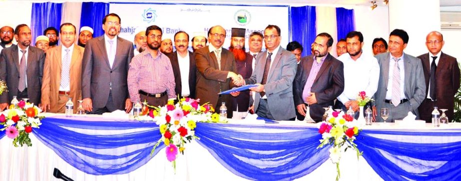 Masihul Huq Chowdhury, Additional Managing Director of Shahjalal Islami Bank Limited signed a Memorandum of Understanding with Md Ibrahim Bahar, President of Hajj Agencies Association of Bangladesh at a city hotel on Thursday. Under the MoU all balloty an