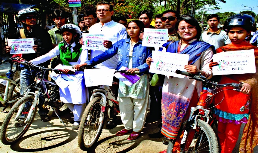 Bangladesh Cycle Lane Implementation Council brought out a rally in the city on Saturday on the occasion of International Women's Day demanding equal rights for women and men.