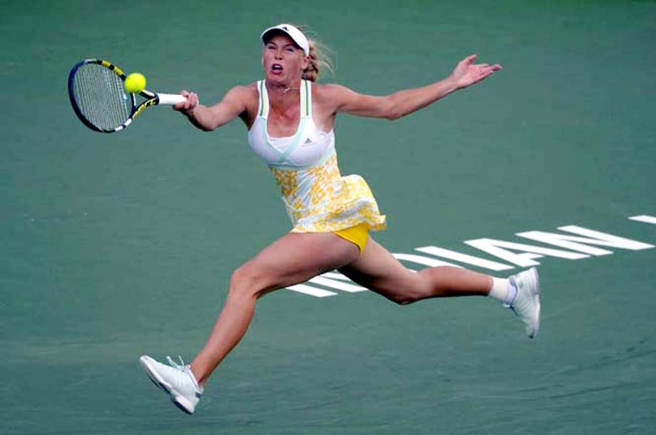 Caroline Wozniacki of Denmark returns a volley from Bojana Jovanovski of Serbia during a second round match at the BNP Paribas Open tennis tournament in Indian Wells, Calif on Friday.