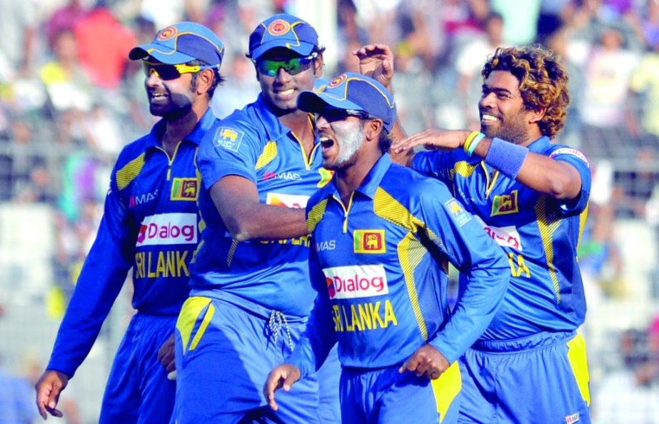 Sri Lankan players celebrate after taking a wicket of Pakistan during the Asia Cup final at the Sher-e-Bangla National Cricket Stadium in Mirpur on Saturday.