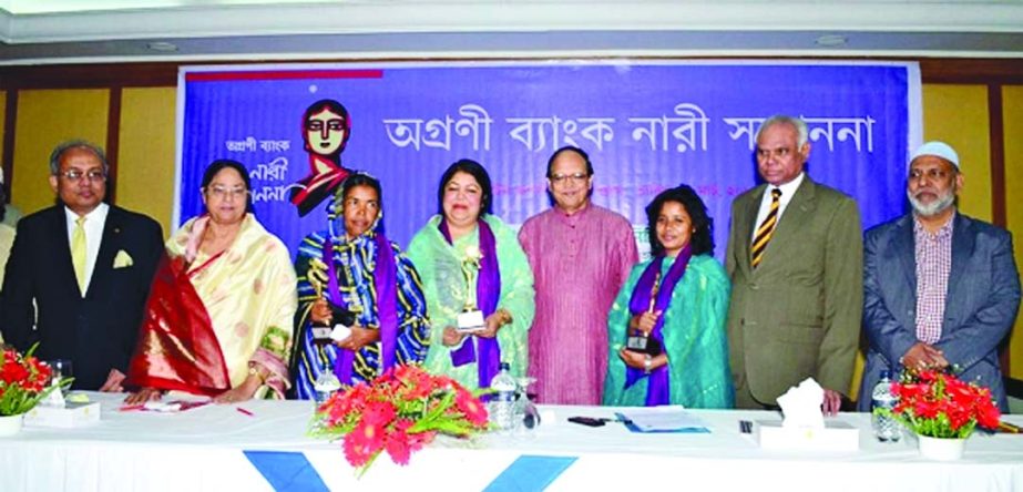 Speaker Dr Shirin Sharmin Chowdhury and Bangladesh Bank Governor Dr Atiur Rahman are seen at a function organized by Agrani Bank Ltd to honour three pioneer female personalities at the International Women's Day on March 7.