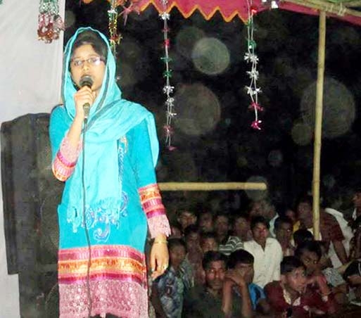 Nisat Akhter, a student of class 9 of Abdul Ghani High School rendering song at the cultural function on Saturday.