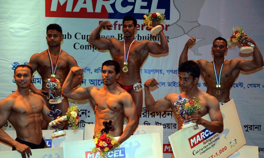 The winners of the Marcel Refrigerator Club Cup Open Bodybuilding Competition pose with their prizes at the Auditorium of the National Sports Council Tower on Monday.