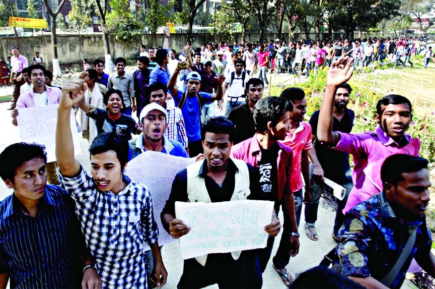 Students of Titumir Government College took to the street on Monday demanding declaration of their college as full-fledged university.