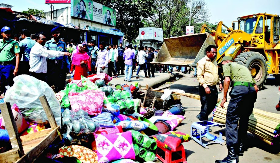 Dhaka South City Corporation with supports from law enforcers evicted unauthorized makeshift shops at DMCH area on Monday.