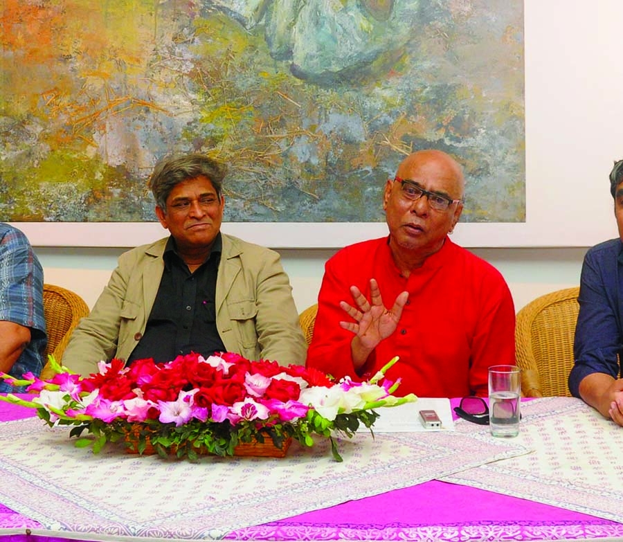 Shahid Kabir (right) speaking at press conference