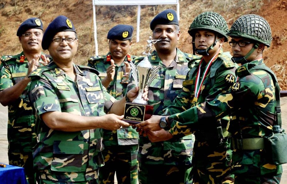 GOC of 9th Infantry Division of Bangladesh Army Major General Chowdhury Hasan Sarwardi, Bir Bikram handing over the winners trophy to 9th Infantry Division, which emerged champions of the Bangladesh Army Firing Competition held at the Savar Cantonment on