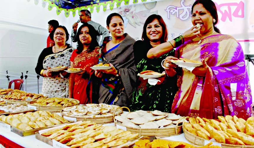 Participants at a cake festival organized for the members of National Press Club and their family members at the club premises in the city on Friday.