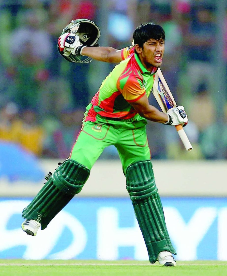Anamul Haque exults after striking the winning six during World T20 Qualifying Group A match between Bangladesh and Afghanistan at Mirpur on Sunday.