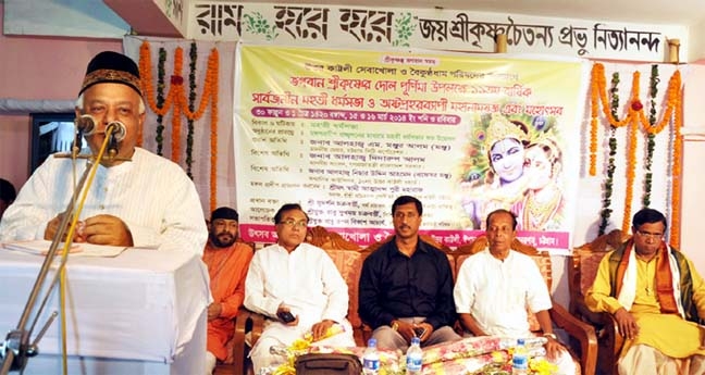 CCC Mayor M Monzoor Alam speaking as Chief Guest at a discussion meeting on the occasion of Dol Purnima of Hindu community organised by Uttar Kartoli Sobakhola Parishad in Chittagong yesterday.