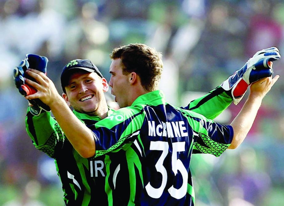 Andy McBrine celebrates a wicket with Gary Wilson during World T20 First Round Group B match between Ireland and Zimbabwe at Sylhet on Monday.