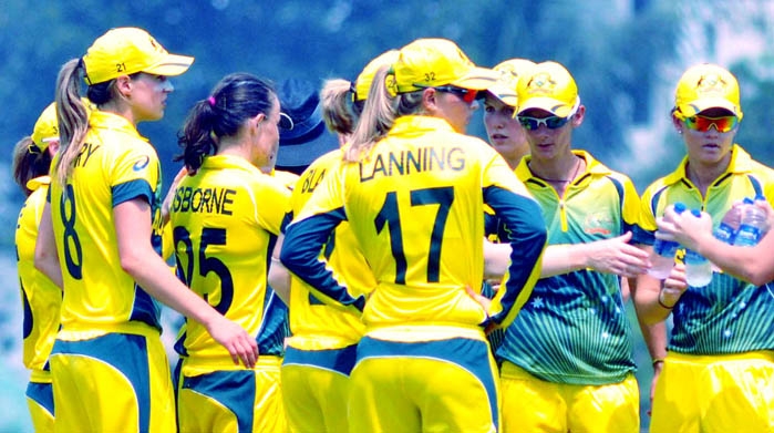 Members of Australia Women's team celebrate after dismissal of a wicket of Sri Lanka Women's team in the Twenty20 warm-up match between Australia Women's team and Sri Lanka Women's team at the BKSP Ground in Savar on Tuesday.