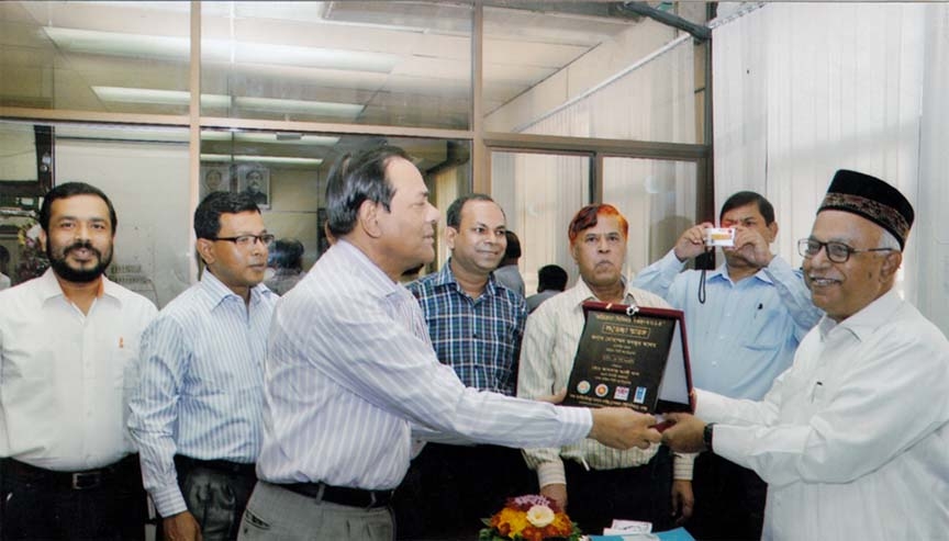 CCC Mayor M Monzoor Alam receiving crest from Anser Ali Khan, Chief Executive Officer of Dhaka South City Corporation recently.