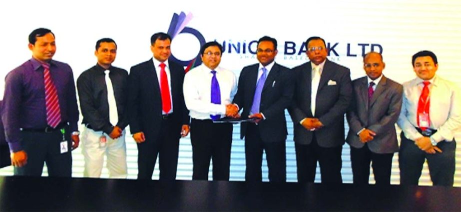 Head of PRD of Union Bank Ltd Abdul Kader and Clinical Operation Director of United Hospital Ltd Dr Dabir Uddin Ahmed sign a Corporate Agreement at the bank's head office on Thursday.