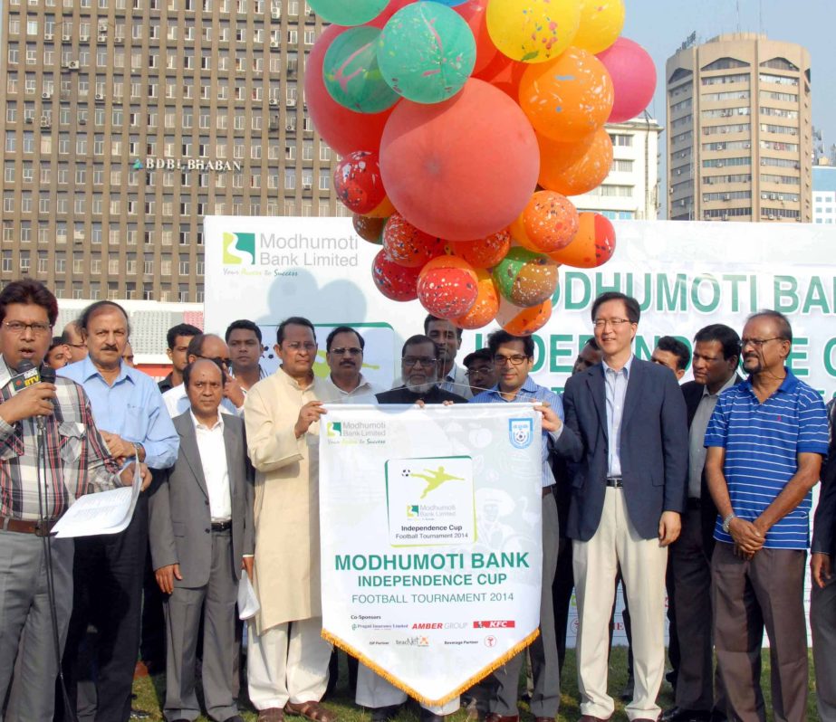 Minister for Liberation War Affairs Mozammel Huq, MP inaugurating the Modhumoti Bank Independence Cup Football Tournament by releasing the balloons as the chief guest at the Bangabandhu National Stadium on Saturday.