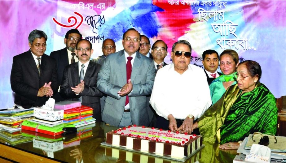 Zainul Haque Sikder, Chairman of National Bank Limited, inaugurating 31st anniversary of the bank at its head office on Sunday. A milad-mahfil was arranged on the occasion. All executives, officers and staffs were present in it.