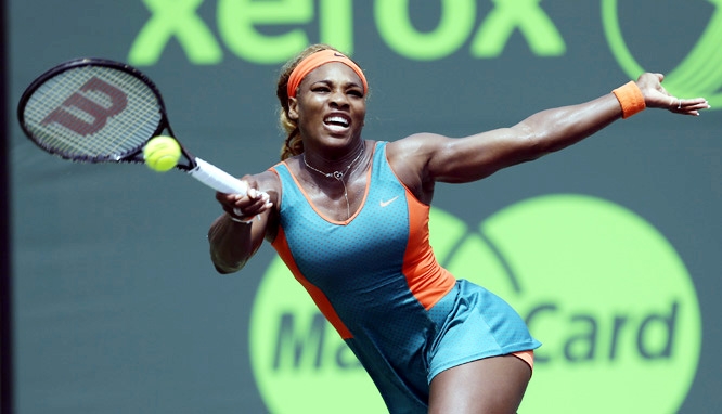 Serena Williams of the United States returns to Caroline Garcia of France at the Sony Open tennis tournament in Key Biscayne, Fla on Saturday.