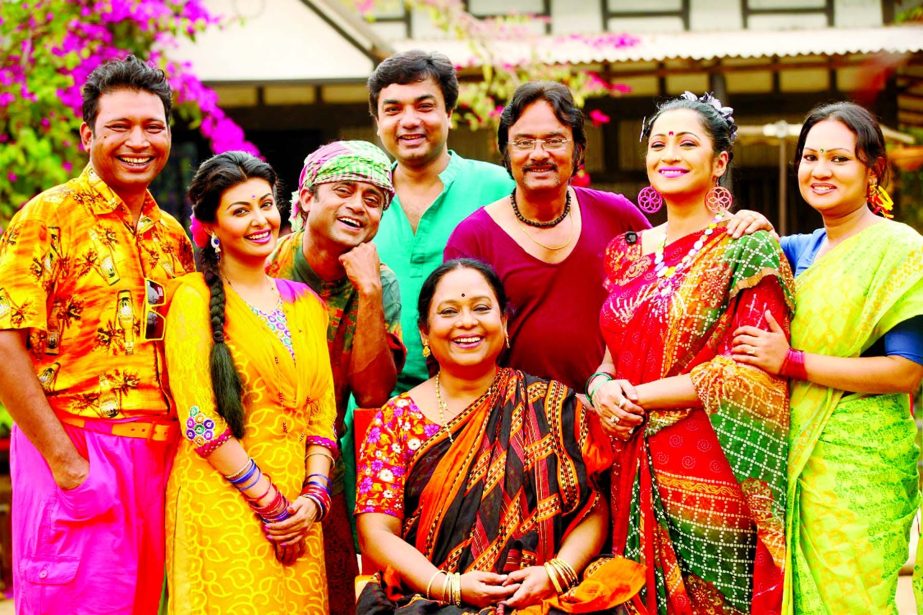 Pran Roy, Mukti, AKhM Hasan, Agun, director Salauddin Lavlu, Wahida Mollick Jolly, Tania Ahmed and Romi at a photo session in the shooting spot of upcoming Eid special seven-episode serial â€˜Ronger Manushera Kemon Achhen?,â€™ a sequel of once po
