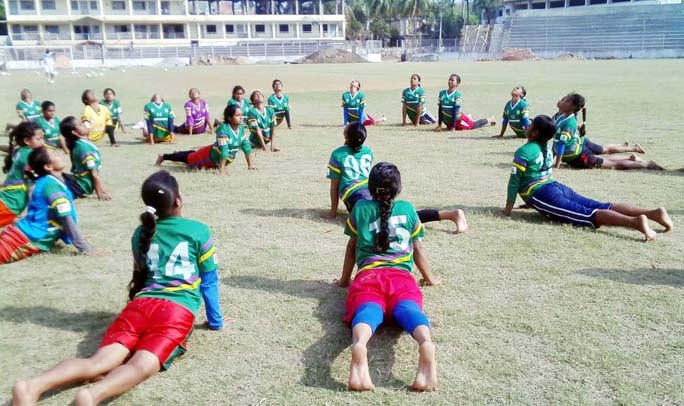 The participants of Plan U-15 Girls' Championship taking part at the practice session in Faridpur Stadium on Monday.