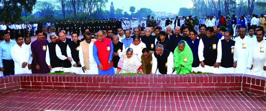 Prime Minister Sheikh Hasina along with party colleagues paying tributes to the martyrs by placing floral wreaths at the Savar National Memorial on Wednesday marking the Independence Day.