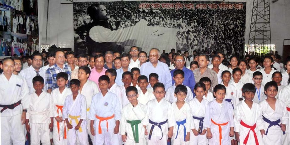 The participants of the Independence Day Karate Competition with the chief guest State Minister for Water Resources Lieutenant Colonel (Retd) Nazrul Islam Hiru, Bir Pratik, President of Bangladesh Karate Federation and Director General of RAB Md Mokhlesur