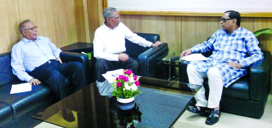 Civil Aviation and Tourism Minister Rashed Khan Menon is seen talking to Raisuddin Ahmed and Shahabuddin Ahmad.