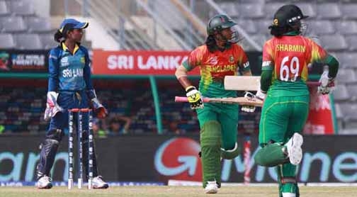 Sharmin Akhter (right) and the other batsman of Bangladesh Women taking run during the Group B match of the ICC Women's World Twenty20 Cricket between Bangladesh Women and Sri Lanka Women at the Sylhet Divisional Stadium on Tuesday.