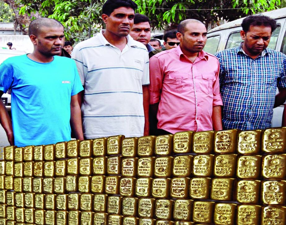 About 149 gold bars missing from Rampura police station recently wave recovered from three Rampura policemen and one of informer on Monday night. Photo shows the arrested 3 policemen along with informer were seen.