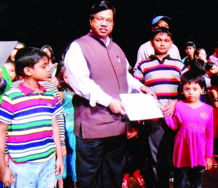 Winners of three-month long children music training workshop Tahsin Rafi and Tamjida Rawja receiving their certificates from Director General of Bangladesh Shilpakala Academy Liaquat Ali Lucky on the Academy premises recently.