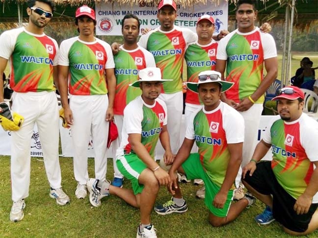 The members of Walton Cricketers of Bangladesh pose for a photo session after defeating Chiang Mai Cricketers of Pakistan by six wickets in their second round match of the Chiang Mai International Six-A-Side Cricket Tournament in Thailand on Thursday.