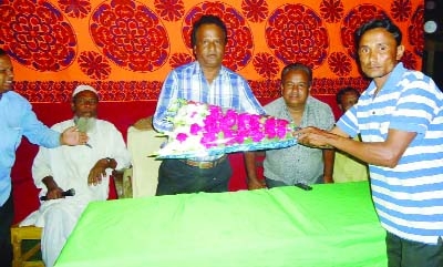 CHUNARUGHAT(Habiganj): Local elite greeting newly-elected Upazila Chairman Abu Taher at Mirashi Haji Bazaar in Chunarughat recently.