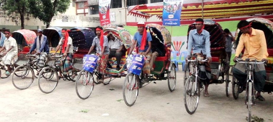 A rickshaw race competition organized by Dhakabashi, an old city-based organization was held in the city's Hazaribagh area on Friday.