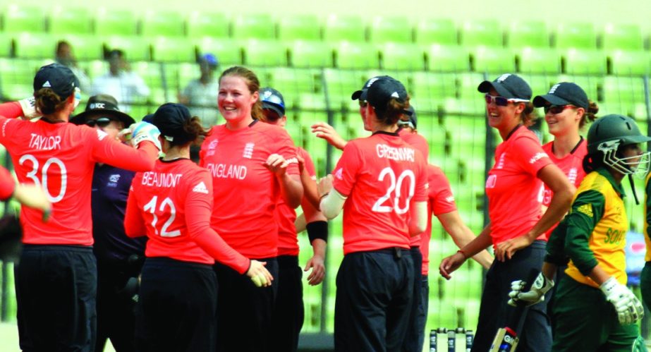 Players of England Women team celebrate after taking the wicket of South Africaâ€™s Trisha Chetty at the Sher-e-Bangla National Cricket Stadium in Mirpur on Friday.