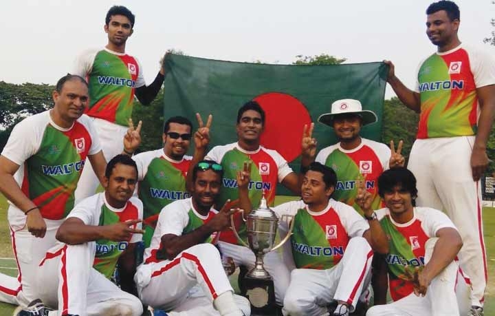 The members of Walton Cricketers of Bangladesh pose for a photo session after defeating Chiang Mai Cricketers of Pakistan by six wickets in the final match of the Chiang Mai International Six-A-Side Cricket Tournament in Thailand on Saturday.
