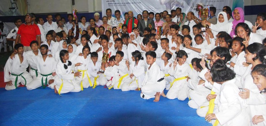 Two-day long Bangladesh School and College Takendo competition concluded at Sultana Kamal Women Sports Complex on Saturday. Prize winners of the competition pose for photo with the guests.