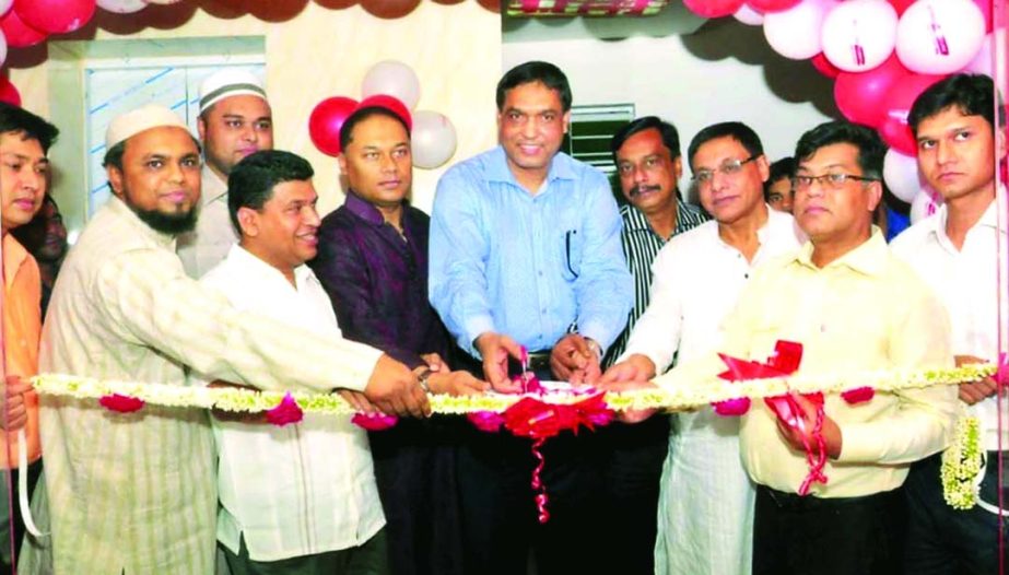 Md Elias Sarker, Managing Director of Brothers Furniture Limited, open its showroom at Mohammadpur Ring Road in the city on Saturday.