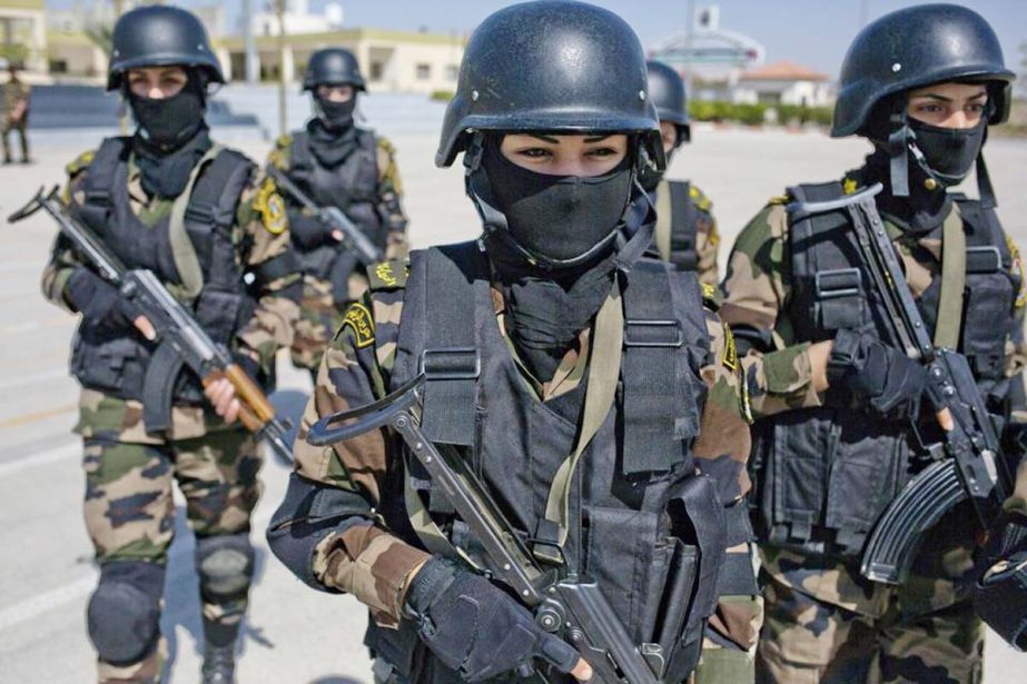 Palestinian women who will become a part of the elite Presidential Guard stand during a training in Jericho, West Bank.